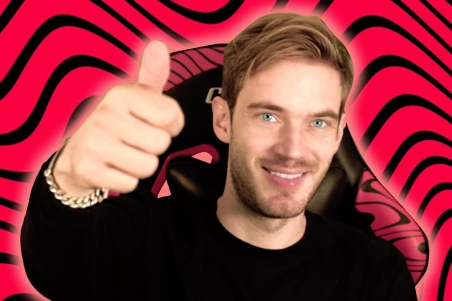 PewDiePie giving a thumbs up with a red and black patterned background.