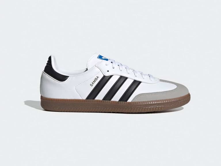 Adidas Samba OG Vegan sneaker in white with black stripes and gum sole, side view.