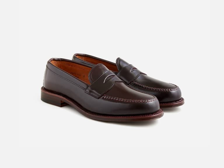 Alden x J.Crew loafers in dark brown leather on a white background.