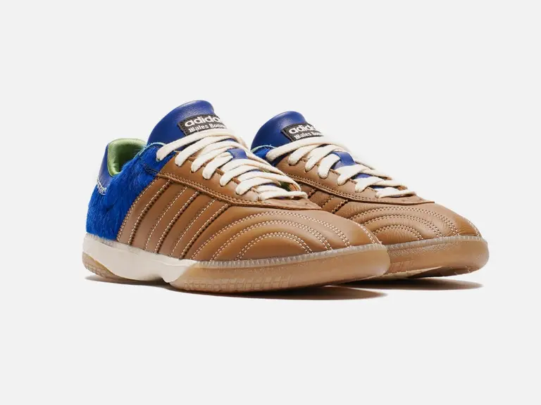 Adidas x Wales Bonner Samba MN sneakers in brown leather with blue suede accents on a white background.