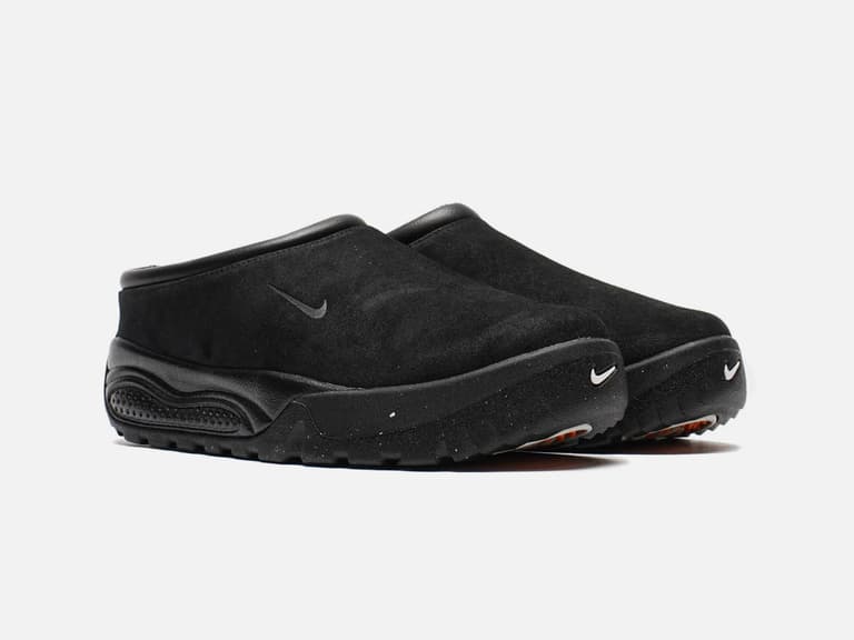 Nike ACG Rufus slip-ons in black suede, side view on a white background.
