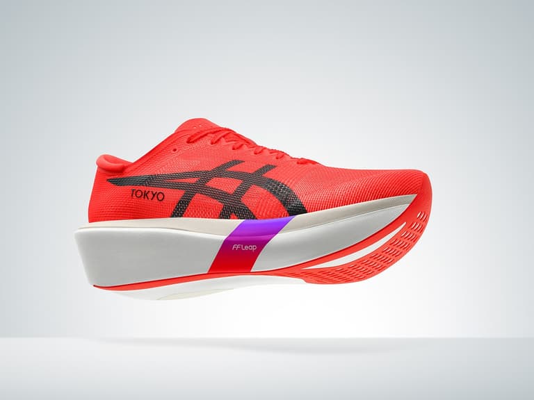 Asics Metaspeed Sky Tokyo in vibrant red with black logo, side view on a light grey background.