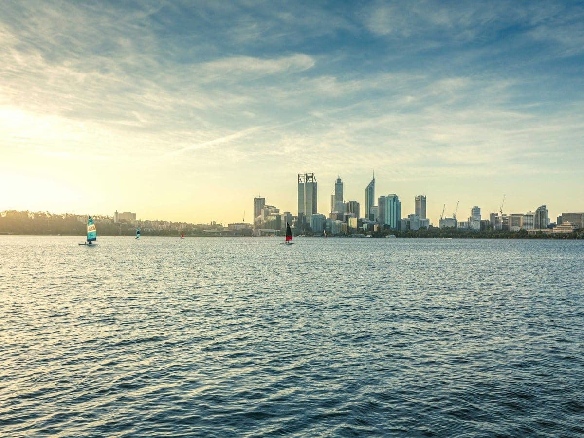 Perth city skyline across the Swan River on a clear day