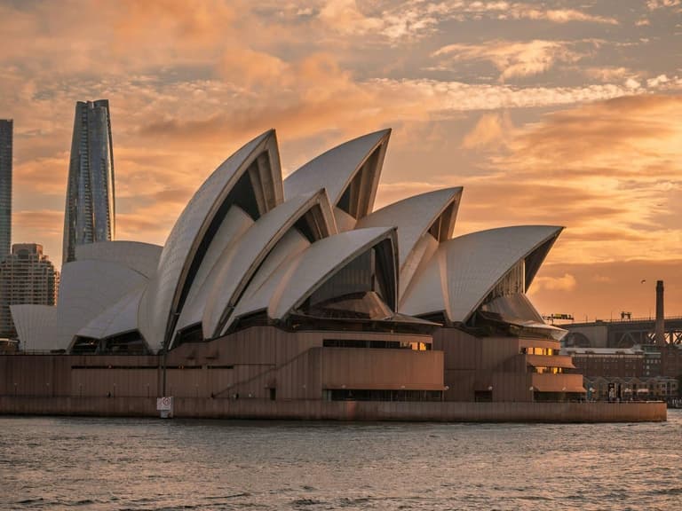Sydney Opera House at sunset on Sydney Harbour