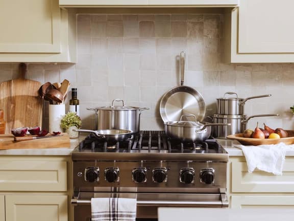Made In Cookware stainless clad pots and pans on a home kitchen stovetop
